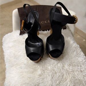 Gucci
Leather Bamboo Buckle Platform Sandal Black Gold